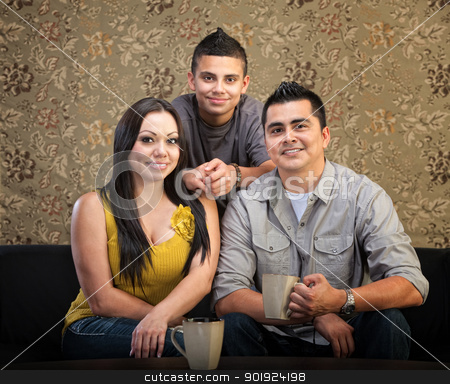 To use this stock image in your creative project, please select the size you need over to the right and click the "Add to Cart" button.
Your downloaded image will come with the Cutcaster watermark removed so don’t worry about the watermark you see on this page. Loving Hispanic Family stock photo, Loving Latino family of three sitting together by Scott Griessel