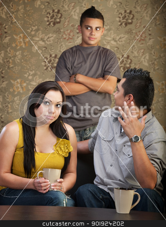 To use this stock image in your creative project, please select the size you need over to the right and click the "Add to Cart" button.
Your downloaded image will come with the Cutcaster watermark removed so don’t worry about the watermark you see on this page. Disprespectful Teen with Parents stock photo, Frustrated father and mother with disrespectful son by Scott Griessel