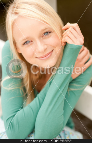 To use this stock image in your creative project, please select the size you need over to the right and click the "Add to Cart" button.
Your downloaded image will come with the Cutcaster watermark removed so don’t worry about the watermark you see on this page. Young and smiling woman stock photo, Portrait from a young and beautiful woman by Picturehunter