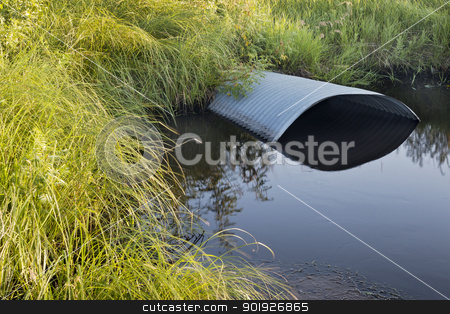 To use this stock image in your creative project, please select the size you need over to the right and click the "Add to Cart" button.
Your downloaded image will come with the Cutcaster watermark removed so don’t worry about the watermark you see on this page. irrigation ditch with culvert stock photo, green meadow and irrigation ditch with culvert by Marek Uliasz