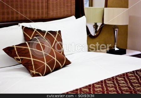 To use this stock image in your creative project, please select the size you need over to the right and click the "Add to Cart" button.
Your downloaded image will come with the Cutcaster watermark removed so don’t worry about the watermark you see on this page. Pillows in Hotel bedroom stock photo, Concept for luxury and Honeymoon, pillows in a luxury hotel by Perseomedusa