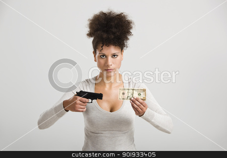 To use this stock image in your creative project, please select the size you need over to the right and click the "Add to Cart" button.
Your downloaded image will come with the Cutcaster watermark removed so don’t worry about the watermark you see on this page. Shooting money stock photo, African woman shooting a US-Dollar banknote, great concept for the global crises by ikostudio