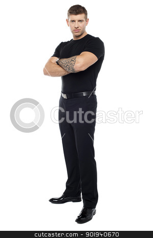 To use this stock image in your creative project, please select the size you need over to the right and click the "Add to Cart" button.
Your downloaded image will come with the Cutcaster watermark removed so don’t worry about the watermark you see on this page. Bouncer with tattoo on hand posing with arms crossed stock photo, Bouncer with tattoo on hand posing with arms crossed isolated against white background by Ishay Botbol