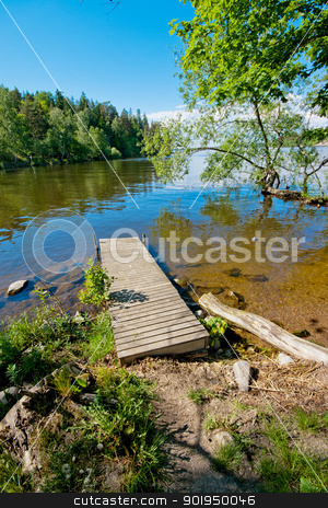 To use this stock image in your creative project, please select the size you need over to the right and click the "Add to Cart" button.
Your downloaded image will come with the Cutcaster watermark removed so don’t worry about the watermark you see on this page. Jetty in water stock photo, A jetty lying in the water on a sunny summer day by Tommy Alsén