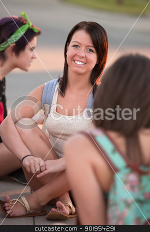To use this stock image in your creative project, please select the size you need over to the right and click the "Add to Cart" button.
Your downloaded image will come with the Cutcaster watermark removed so don’t worry about the watermark you see on this page. Cute Teen Girl Outside stock photo, Cheerful Caucasian teen sitting on the ground with friends by Scott Griessel