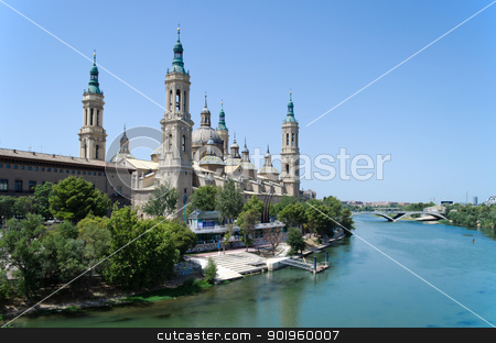 To use this stock image in your creative project, please select the size you need over to the right and click the "Add to Cart" button.
Your downloaded image will come with the Cutcaster watermark removed so don’t worry about the watermark you see on this page. Saragozza cathedral and Ebro river stock photo, Saragozza cathedral seen from the Ebro river in a sunny day by Stefano Cavoretto