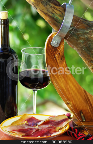 To use this stock image in your creative project, please select the size you need over to the right and click the "Add to Cart" button.
Your downloaded image will come with the Cutcaster watermark removed so don’t worry about the watermark you see on this page. Spanish Jamon and red wine. stock photo, Spanish Jamon and red wine. by Inacio Pires