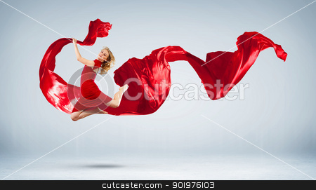 To use this stock image in your creative project, please select the size you need over to the right and click the "Add to Cart" button.
Your downloaded image will come with the Cutcaster watermark removed so don’t worry about the watermark you see on this page. Modern style dancer posing stock photo, Portrait of a dancing young woman with red fabric by Sergey Nivens