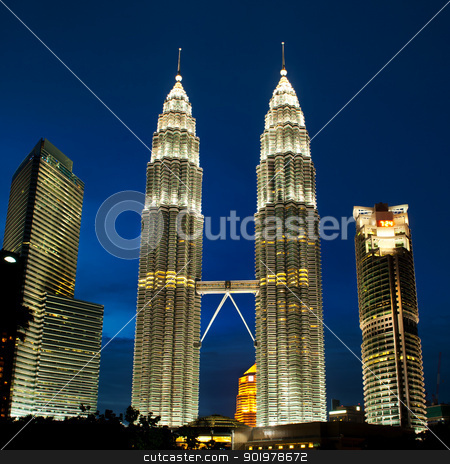 To use this stock image in your creative project, please select the size you need over to the right and click the "Add to Cart" button.
Your downloaded image will come with the Cutcaster watermark removed so don’t worry about the watermark you see on this page. Cityscape of Kuala Lumpur, Malaysia with Petronas towers. stock photo, Cityscape of Kuala Lumpur, Malaysia. Petronas twin towers at KLCC. by Pablo Caridad