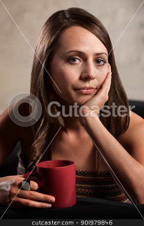 To use this stock image in your creative project, please select the size you need over to the right and click the "Add to Cart" button.
Your downloaded image will come with the Cutcaster watermark removed so don’t worry about the watermark you see on this page. Calm Woman Holding Red Mug stock photo, Calm young white woman with hand on cheek by Scott Griessel