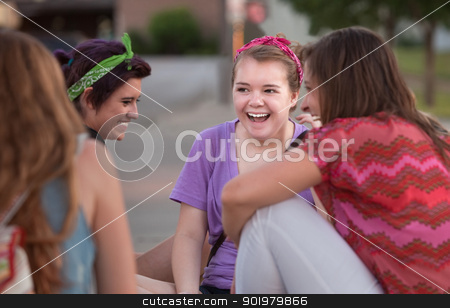 To use this stock image in your creative project, please select the size you need over to the right and click the "Add to Cart" button.
Your downloaded image will come with the Cutcaster watermark removed so don’t worry about the watermark you see on this page. Four Teen Girls Giggling stock photo, Mixed group of four teenage girls outside giggling by Scott Griessel