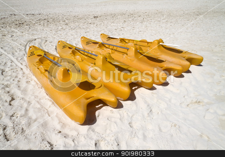 To use this stock image in your creative project, please select the size you need over to the right and click the "Add to Cart" button.
Your downloaded image will come with the Cutcaster watermark removed so don’t worry about the watermark you see on this page. Orange Paddle Boats stock photo, A group of empty orange paddle boats by Kevin Tietz