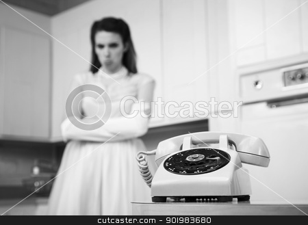 To use this stock image in your creative project, please select the size you need over to the right and click the "Add to Cart" button.
Your downloaded image will come with the Cutcaster watermark removed so don’t worry about the watermark you see on this page. Bride Waiting By The Telephone stock photo, Bride waits by the phone in a retro-style kitchen scene by Scott Griessel