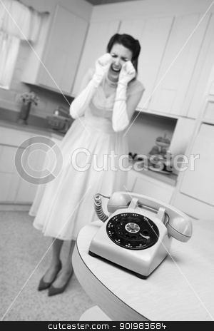 To use this stock image in your creative project, please select the size you need over to the right and click the "Add to Cart" button.
Your downloaded image will come with the Cutcaster watermark removed so don’t worry about the watermark you see on this page. Woman Weeps By The Telephone stock photo, Young Caucasian woman weeps near a phone in a retro-style kitchen scene by Scott Griessel