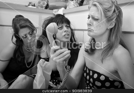 To use this stock image in your creative project, please select the size you need over to the right and click the "Add to Cart" button.
Your downloaded image will come with the Cutcaster watermark removed so don’t worry about the watermark you see on this page. Upset Woman With Friends stock photo, Pouting woman on phone with friends in kitchen by Scott Griessel