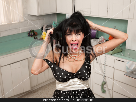 To use this stock image in your creative project, please select the size you need over to the right and click the "Add to Cart" button.
Your downloaded image will come with the Cutcaster watermark removed so don’t worry about the watermark you see on this page. Drunk Woman Pulls Her Hair stock photo, Weeping housewife in retro-style kitchen pulls her hair by Scott Griessel