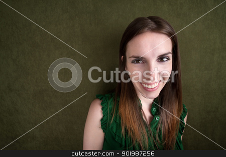 To use this stock image in your creative project, please select the size you need over to the right and click the "Add to Cart" button.
Your downloaded image will come with the Cutcaster watermark removed so don’t worry about the watermark you see on this page. Beautiful Young Woman stock photo, Portrait of a pretty young Caucasian woman on green background by Scott Griessel
