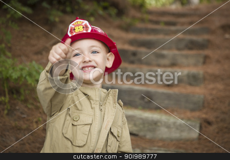 To use this stock image in your creative project, please select the size you need over to the right and click the "Add to Cart" button.
Your downloaded image will come with the Cutcaster watermark removed so don’t worry about the watermark you see on this page. Adorable Child Boy with Fireman Hat Playing Outside stock photo, Happy Adorable Child Boy with Fireman Hat and Thumbs Up Playing Outside. by Andy Dean