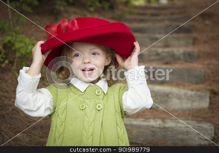 To use this stock image in your creative project, please select the size you need over to the right and click the "Add to Cart" button.
Your downloaded image will come with the Cutcaster watermark removed so don’t worry about the watermark you see on this page. Adorable Child Girl with Red Hat Playing Outside stock photo, Happy Adorable Child Girl with Red Hat Playing Outside. by Andy Dean