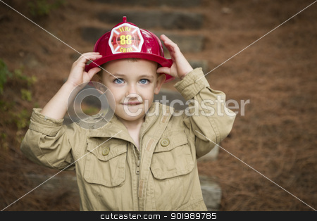To use this stock image in your creative project, please select the size you need over to the right and click the "Add to Cart" button.
Your downloaded image will come with the Cutcaster watermark removed so don’t worry about the watermark you see on this page. Adorable Child Boy with Fireman Hat Playing Outside stock photo, Happy Adorable Child Boy with Fireman Hat Playing Outside. by Andy Dean