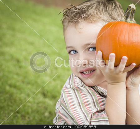 To use this stock image in your creative project, please select the size you need over to the right and click the "Add to Cart" button.
Your downloaded image will come with the Cutcaster watermark removed so don’t worry about the watermark you see on this page. Cute Young Child Boy Enjoying the Pumpkin Patch. stock photo, Adorable Young Child Boy Enjoying the Pumpkins at the Pumpkin Patch. by Andy Dean