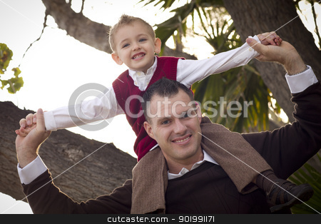 To use this stock image in your creative project, please select the size you need over to the right and click the "Add to Cart" button.
Your downloaded image will come with the Cutcaster watermark removed so don’t worry about the watermark you see on this page. Handsome Father and Son in the Park stock photo, Young Laughing Father and Child Having Piggy Back Fun in the Park. by Andy Dean