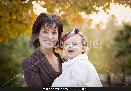 To use this stock image in your creative project, please select the size you need over to the right and click the "Add to Cart" button.
Your downloaded image will come with the Cutcaster watermark removed so don’t worry about the watermark you see on this page. Attractive Mother and Daughter Portrait Outside stock photo, Attractive Mother and Daughter Portrait Outside at the Park. by Andy Dean
