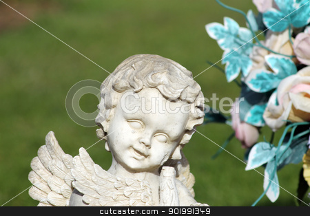 To use this stock image in your creative project, please select the size you need over to the right and click the "Add to Cart" button.
Your downloaded image will come with the Cutcaster watermark removed so don’t worry about the watermark you see on this page. Angel statue and flower bouquet stock photo, Happy angel statue and flower bouquet, part of a cemetery memerial with green grass background and copy space. by Martin Crowdy