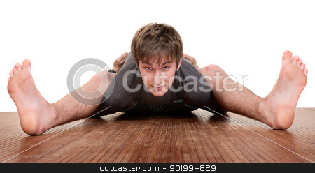 To use this stock image in your creative project, please select the size you need over to the right and click the "Add to Cart" button.
Your downloaded image will come with the Cutcaster watermark removed so don’t worry about the watermark you see on this page. Young Yoga Expert stock photo, Young white male yoga practitioner stretching on floor by Scott Griessel