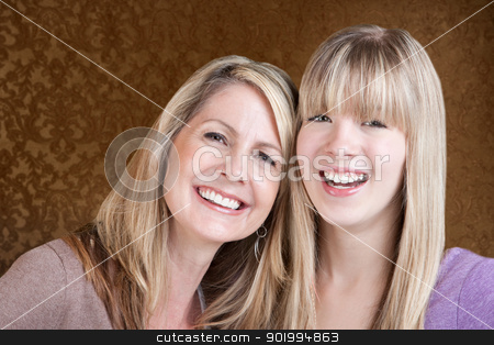 To use this stock image in your creative project, please select the size you need over to the right and click the "Add to Cart" button.
Your downloaded image will come with the Cutcaster watermark removed so don’t worry about the watermark you see on this page. Happy Mom and Daughter stock photo, Happy Caucasian mom and daughter smile over green background by Scott Griessel