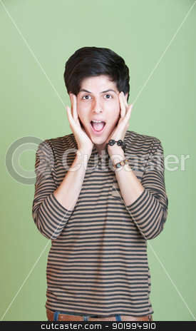 To use this stock image in your creative project, please select the size you need over to the right and click the "Add to Cart" button.
Your downloaded image will come with the Cutcaster watermark removed so don’t worry about the watermark you see on this page. Scared Teen stock photo, Shocked Latino teen with hands on head over green background by Scott Griessel