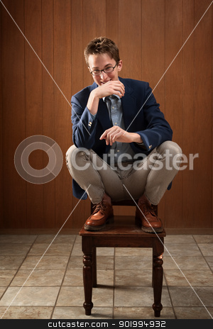 To use this stock image in your creative project, please select the size you need over to the right and click the "Add to Cart" button.
Your downloaded image will come with the Cutcaster watermark removed so don’t worry about the watermark you see on this page. Happy Young Caucasian Man stock photo, Happy young Caucasian man on a chair by Scott Griessel