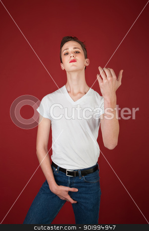 To use this stock image in your creative project, please select the size you need over to the right and click the "Add to Cart" button.
Your downloaded image will come with the Cutcaster watermark removed so don’t worry about the watermark you see on this page. Aggressive Teen stock photo, Aggressive young Caucasian gang member grabs his crotch by Scott Griessel