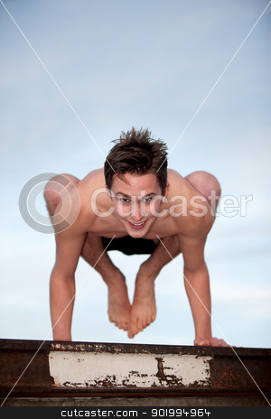 To use this stock image in your creative project, please select the size you need over to the right and click the "Add to Cart" button.
Your downloaded image will come with the Cutcaster watermark removed so don’t worry about the watermark you see on this page. Yoga Exercise stock photo, Happy young man doing the Bakasana yoga posture by Scott Griessel