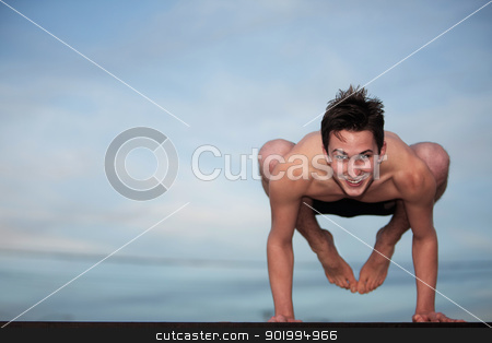 To use this stock image in your creative project, please select the size you need over to the right and click the "Add to Cart" button.
Your downloaded image will come with the Cutcaster watermark removed so don’t worry about the watermark you see on this page. Happy Young Man Doing Yoga stock photo, Happy young Caucasian man doing the Bakasana posture by Scott Griessel