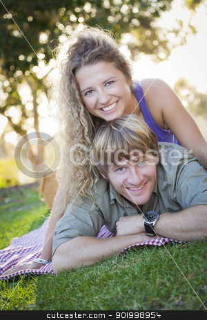 To use this stock image in your creative project, please select the size you need over to the right and click the "Add to Cart" button.
Your downloaded image will come with the Cutcaster watermark removed so don’t worry about the watermark you see on this page. An Attractive Couple Enjoying A Day in the Park stock photo, An Attractive Couple Enjoying A Day in the Park Together. by Andy Dean