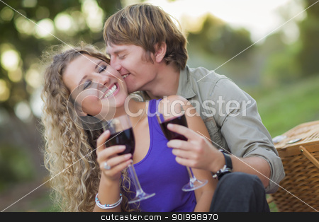 To use this stock image in your creative project, please select the size you need over to the right and click the "Add to Cart" button.
Your downloaded image will come with the Cutcaster watermark removed so don’t worry about the watermark you see on this page. An Attractive Couple Enjoying A Glass Of Wine in the Park stock photo, An Attractive Couple Enjoying A Glass Of Wine in the Park Together. by Andy Dean