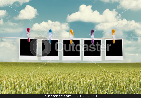 To use this stock image in your creative project, please select the size you need over to the right and click the "Add to Cart" button.
Your downloaded image will come with the Cutcaster watermark removed so don’t worry about the watermark you see on this page. Photos hanging and flying in the wind stock photo, Photos hanging and flying in the wind by ARNIS LAZDINS