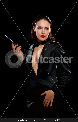 To use this stock image in your creative project, please select the size you need over to the right and click the "Add to Cart" button.
Your downloaded image will come with the Cutcaster watermark removed so don’t worry about the watermark you see on this page. Beautiful young woman with cigarette stock photo, Beautiful young woman with cigarette wearing a black suit by Sergii Sukhorukov