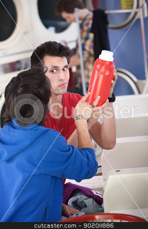 To use this stock image in your creative project, please select the size you need over to the right and click the "Add to Cart" button.
Your downloaded image will come with the Cutcaster watermark removed so don’t worry about the watermark you see on this page. Confused Guys In Laundromat stock photo, Two confused young men in laundromat read the instructions on detergent or conditioner canister by Scott Griessel