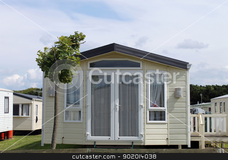 To use this stock image in your creative project, please select the size you need over to the right and click the "Add to Cart" button.
Your downloaded image will come with the Cutcaster watermark removed so don’t worry about the watermark you see on this page. Static caravan in trailer park stock photo, Static caravan in trailer park. Scarborough, England. by Martin Crowdy