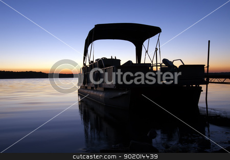 To use this stock image in your creative project, please select the size you need over to the right and click the "Add to Cart" button.
Your downloaded image will come with the Cutcaster watermark removed so don’t worry about the watermark you see on this page. Boat at Sunrise stock photo, A boat silhouetted in the sunrise by Delmas Lehman