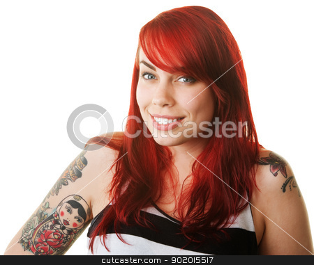 To use this stock image in your creative project, please select the size you need over to the right and click the "Add to Cart" button.
Your downloaded image will come with the Cutcaster watermark removed so don’t worry about the watermark you see on this page. Happy Woman with Tattoo stock photo, Happy woman in red hair with russian doll tattoo by Scott Griessel
