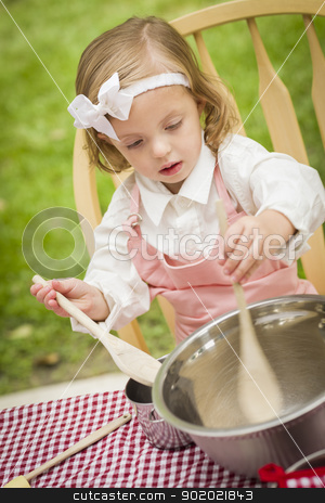 To use this stock image in your creative project, please select the size you need over to the right and click the "Add to Cart" button.
Your downloaded image will come with the Cutcaster watermark removed so don’t worry about the watermark you see on this page. Adorable Little Girl Playing Chef Cooking stock photo, Happy Adorable Little Girl Playing Chef Cooking in Her Pink Outfit. by Andy Dean