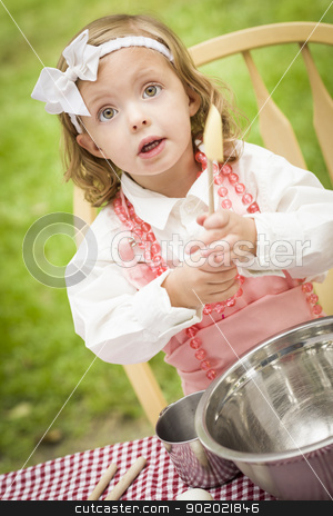 To use this stock image in your creative project, please select the size you need over to the right and click the "Add to Cart" button.
Your downloaded image will come with the Cutcaster watermark removed so don’t worry about the watermark you see on this page. Adorable Little Girl Playing Chef Cooking stock photo, Happy Adorable Little Girl Playing Chef Cooking in Her Pink Outfit. by Andy Dean