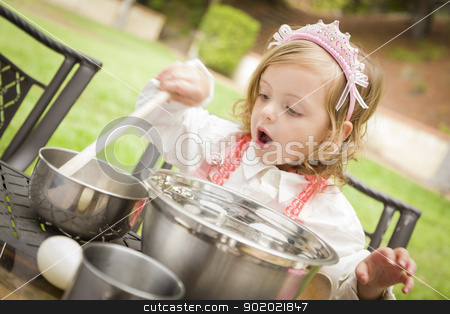 To use this stock image in your creative project, please select the size you need over to the right and click the "Add to Cart" button.
Your downloaded image will come with the Cutcaster watermark removed so don’t worry about the watermark you see on this page. Adorable Little Girl Playing Chef Cooking stock photo, Happy Adorable Little Girl Playing Chef Cooking in Her Pink Outfit. by Andy Dean