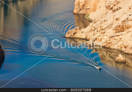 To use this stock image in your creative project, please select the size you need over to the right and click the "Add to Cart" button.
Your downloaded image will come with the Cutcaster watermark removed so don’t worry about the watermark you see on this page. Boat leaving waves in Zrmanja river canyon stock photo, Boat leaving waves in Zrmanja river canyon, Dalmatia, Croatia by xbrchx
