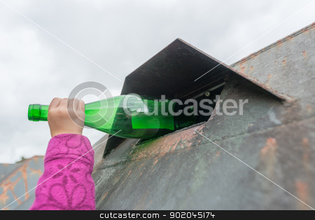 To use this stock image in your creative project, please select the size you need over to the right and click the "Add to Cart" button.
Your downloaded image will come with the Cutcaster watermark removed so don’t worry about the watermark you see on this page. Glass waste stock photo, Person throwing a green bottle in a container by Picturehunter