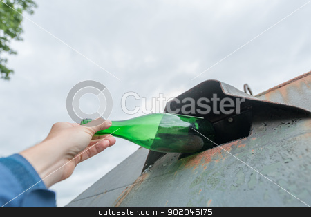 To use this stock image in your creative project, please select the size you need over to the right and click the "Add to Cart" button.
Your downloaded image will come with the Cutcaster watermark removed so don’t worry about the watermark you see on this page. Glass waste stock photo, Person throwing a green bottle in a container by Picturehunter