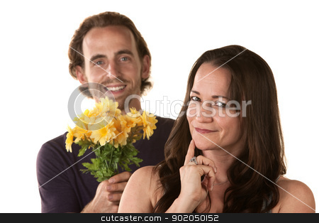 To use this stock image in your creative project, please select the size you need over to the right and click the "Add to Cart" button.
Your downloaded image will come with the Cutcaster watermark removed so don’t worry about the watermark you see on this page. Young Couple Expressing Forgiveness stock photo, Grinning woman and smiling man holding flowers by Scott Griessel